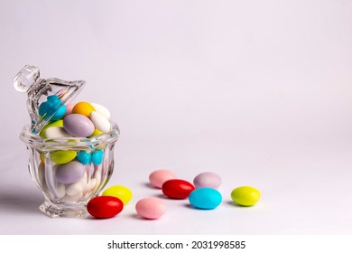 Colorful Almond Candies In The Stylish,crystal Candy Bowl On White With Copy Space.The Sugar Feast Concept. (Turkish Name; Ramadan - Ramazan Bayrami, Seker Bayrami)