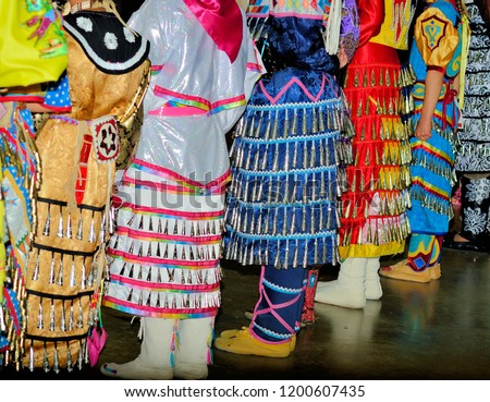 Colorful American Indian Jingle dresses.