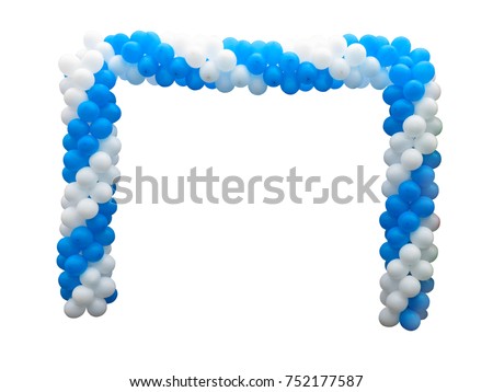 Colorful arch of white and blue balloons isolated over background .     