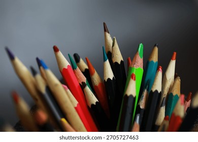 Colorful Array of Sharp Colored Pencils in Close-Up Macro View for Art and Creativity