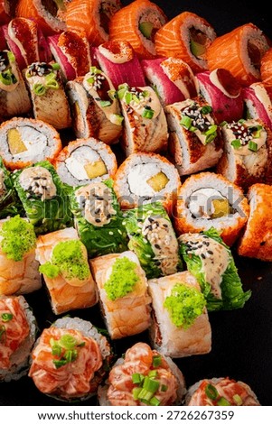 A colorful array of sushi rolls showcasing culinary artistry and creativity.