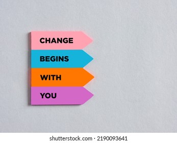 Colorful arrow shaped stickers with the message change begins with you. Business career or lifestyle motivational message. - Shutterstock ID 2190093641