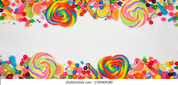 Colorful assorted candies. Above view double border with a white banner background. - Powered by Shutterstock
