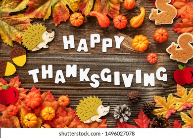 Colorful Autumn Decoration, Text Happy Thanksgiving, Wooden Background