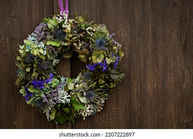 Colorful Autumn Flower Wreath With Hydrangea On A Wooden Door