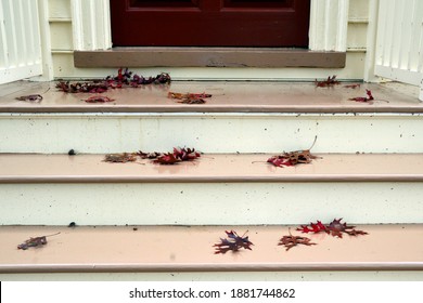 Colorful Autumn Leaves Fallen On Wooden Porch Steps