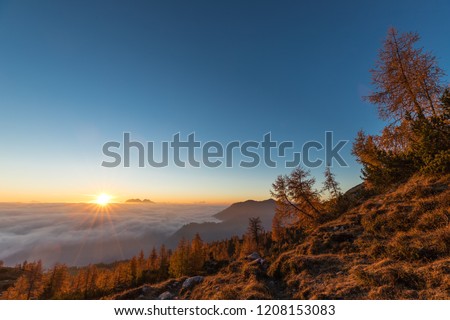 Colorful Autumn Sunrise Above The Clouds In The Lienz Dolmites Above Hochstadelhaus