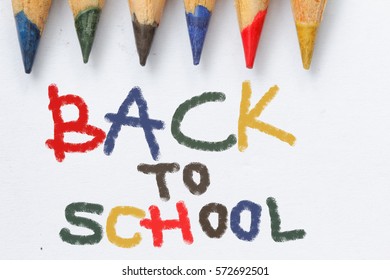 Colorful Back To School Words On Isolated Background With Part Of Color Pencil Tips Shown In The Frame. Concept Of Back To School, Preparation,routine.