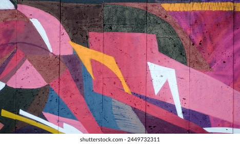 Colorful background of graffiti painting artwork with bright aerosol outlines on wall. Old school street art piece made with aerosol spray paint cans. Contemporary youth culture backdrop - Powered by Shutterstock