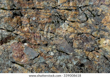 Colorful background  textured stone with iron oxide