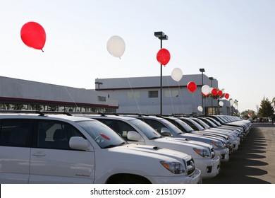 Colorful balloons entice car buyers to stop and look