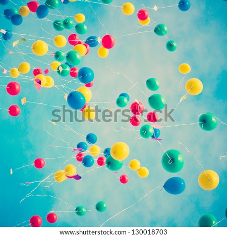 Colorful balloons in flight