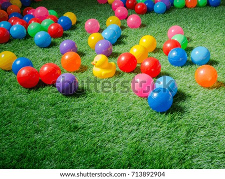 Colorful Balls on green grass