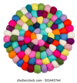 Colorful balls of wool. Colorful felt balls. Dried balls of wool. Colored beads. Felt handmade. Potholder with colorful beads.Isolated on white background.
