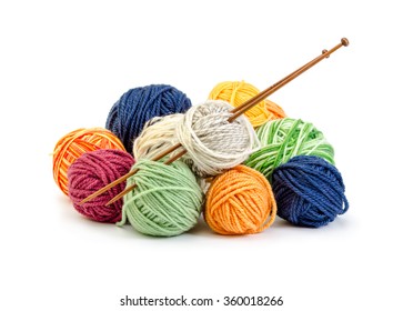 Colorful balls of yarn and wooden needles isolated on white background - Powered by Shutterstock