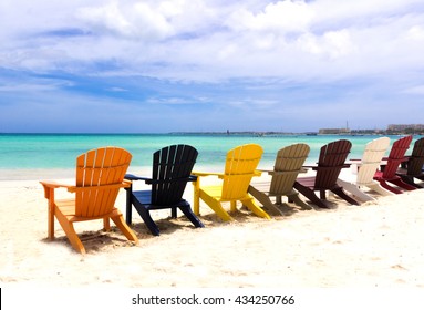 Colorful Beach Chairs On Caribbean Coast 