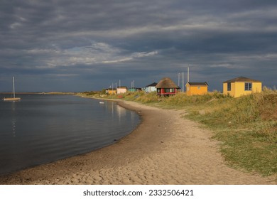 Colorful beach houses at Eriks Hale in Marstal on the Danish island of Ærø.