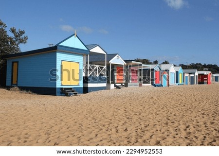 Colorful beachhouses on the beach at Mount Martha in Victoria, Australia on a sunny day