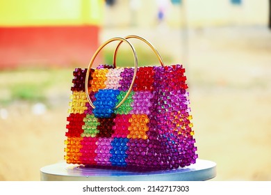 Colorful beaded bag made of square beads. Fruit basket. Travelling bag and fashion bag.
