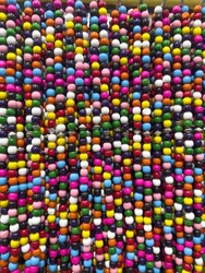 Colorful Beads Background. Background Pattern Of Multicolored Natural Stone Beads. String Of Beads In Various Colors. Colorful Beads Necklaces. Handicraft Fashionable For Women
