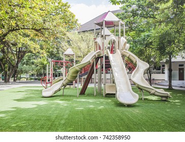  Colorful Big Plastic Toy Set On Green Artificial Grass In Kindergarten School  Playground  Area