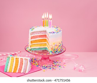 Colorful Birthday cake on pink