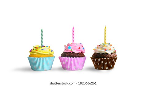 Colorful Birthday Cupcakes With Candles On A White Background. Copy Space