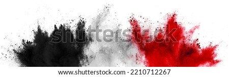 colorful black white red flag black color paint powder explosion on isolated background. old german frankfurt syrian egyptian colors celebration soccer travel tourism concept