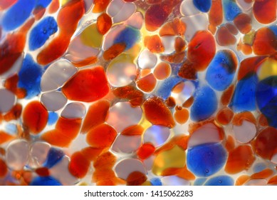 Colorful Blown Glass Ball. Textured Colored Glass Abstract Background. 