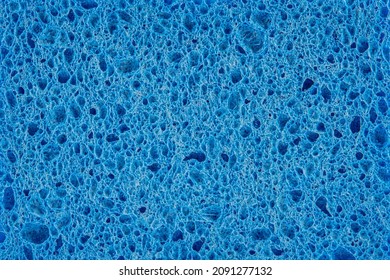 colorful blue foam rubber sponges isolated on a white background for washing dishes. - Shutterstock ID 2091277132