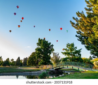 Colorful Boise Event With Balloons And A Green Foot Bridge