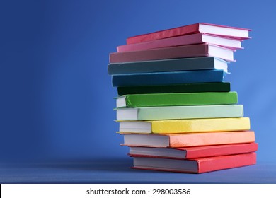 Colorful Books On Blue Background