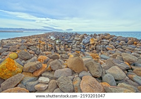 Colorful Boulders of a Breakwater on the California Coast at Morro Bay