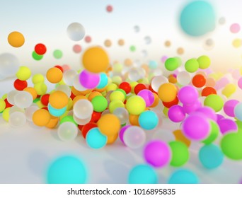 Colorful Bouncing Balls Outdoors Against Blue Sunny Sky