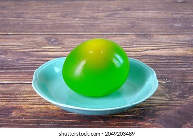 Colorful Bouncy Eggs. Funny Experiment For Kids, The Egg Becomes Bouncy As A Result Of A Chemical Reaction Between The Eggshell And The Vinegar. Science Classroom