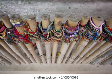 Colorful Bracelets On Bamboo Fence At The Killing Fields For Victims In The Cambodian Genocide 