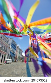 Colorful Brazilian wish ribbons waving in the sky above colonial architecture of Pelourinho Salvador Bahia Brazil