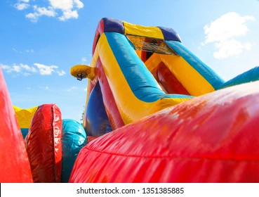 
Colorful And Bright Bounce House Outside.