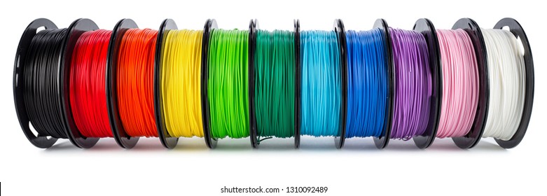 colorful bright wide panorama row of spool 3d printer pla abs filament plastic material isolated on white background