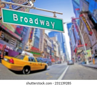 Colorful Broadway Sign Over Times Square Background