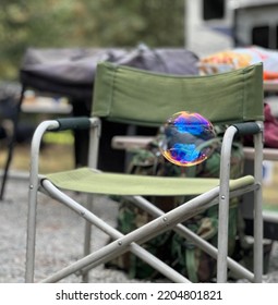 Colorful Bubble Floating Pass A Green Lawn Chair, September, 2022