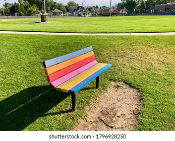 Colorful Buddy Bench In The Middle Of A Park Or Elementary School