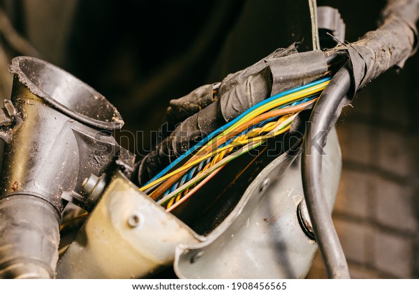 Colorful cables to be repaired. Cable in a car. Repair\
accident vehicles 