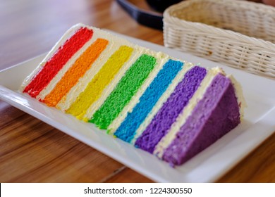 Colorful cakes are divided into layers. Called Rainbow Cake Sweet and sour taste of cream cheese