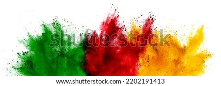 colorful cameroonian flag green red yellow color holi paint powder explosion on isolated white background. cameroon africa  celebration soccer travel tourism concept