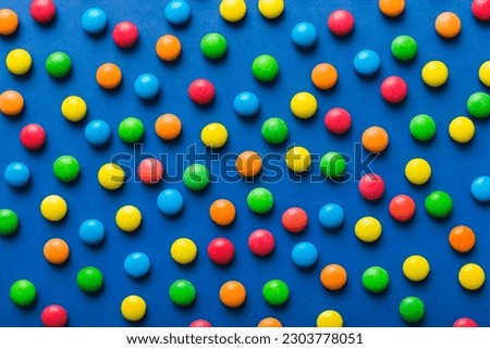 colorful candies as background top view. Seamless pattern with candy. Many sweet candies close-up.