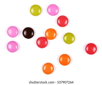 Colorful candies isolated on white, top view