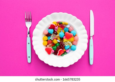 Colorful Candies On A Plate. Unhealthy Food And Too Much Sugar Concept.