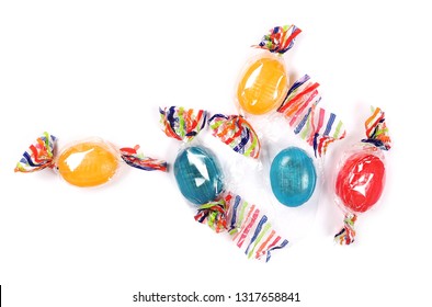 Colorful Candies With Transparent Cellophane Wrapping Isolated On White Background, Top View