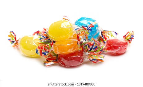 Colorful Candies With Transparent Cellophane Wrapping, Sweets Pile Isolated On White Background 